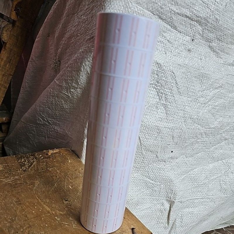 

isi kertas label stiker pasang ke alat labeller