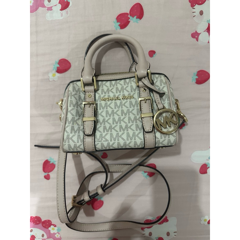 mk mini sling bag