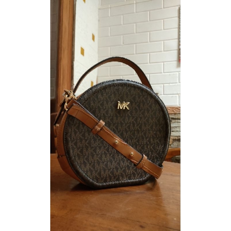 Preloved tas selempang wanita, bahan kulit, MK Delaney Medium Logo Canteen Crossbodybag