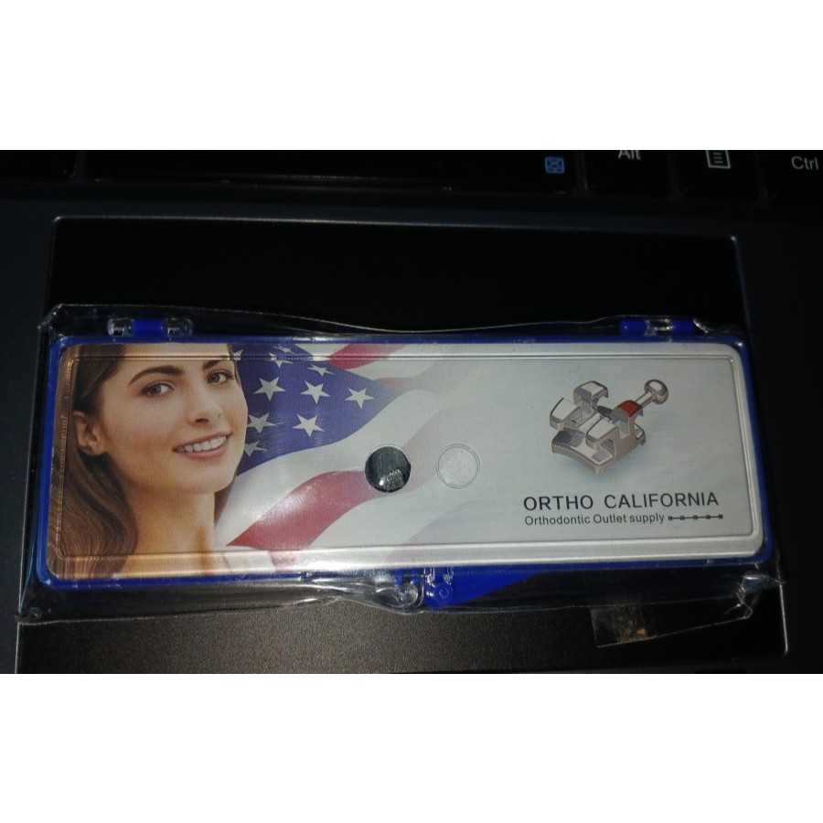 BRACKET BEHEL CERAMIC CLEAR TRANSPARAN ORTHODONTIC ORTHOMERICA - BRACES Permanen American Roth Hook 