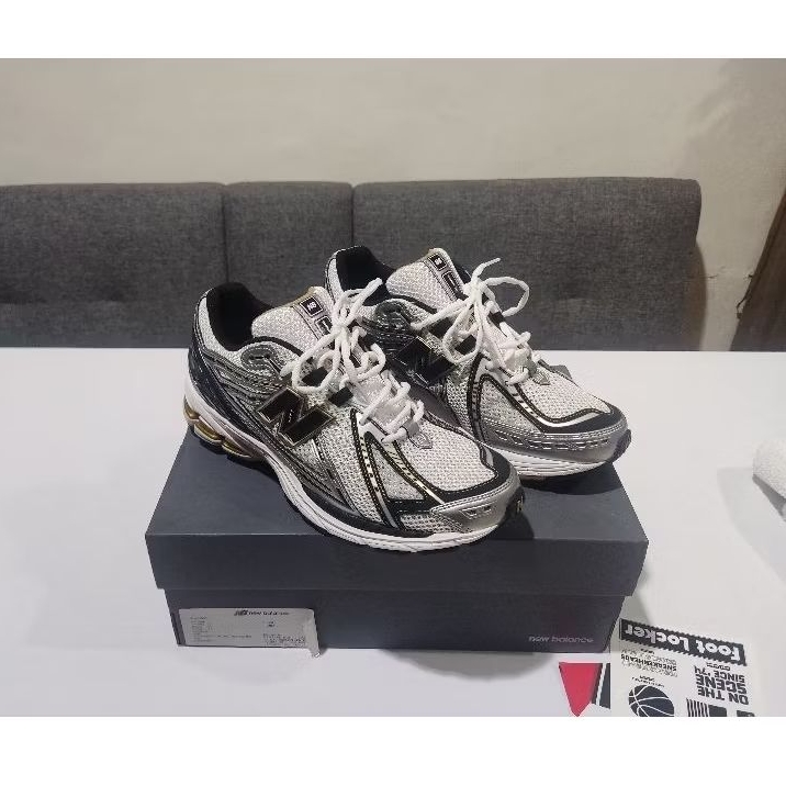 New Balance 1906r black white gold