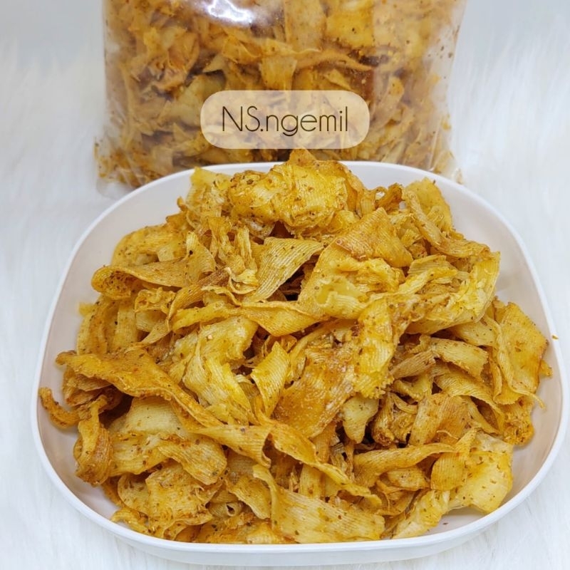 

Keripik Singkong Pedas Gurih Brekele Khas Kebumen Berat 200 Gram / Keripik Pedas Asin Daun Jeruk