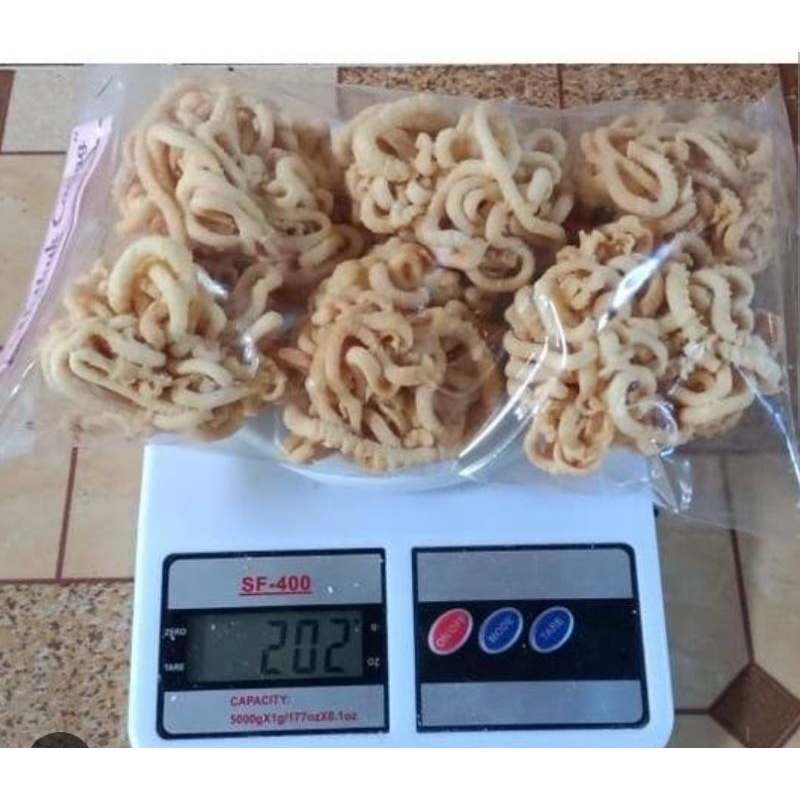 

kue putu/utuk cacing wijen