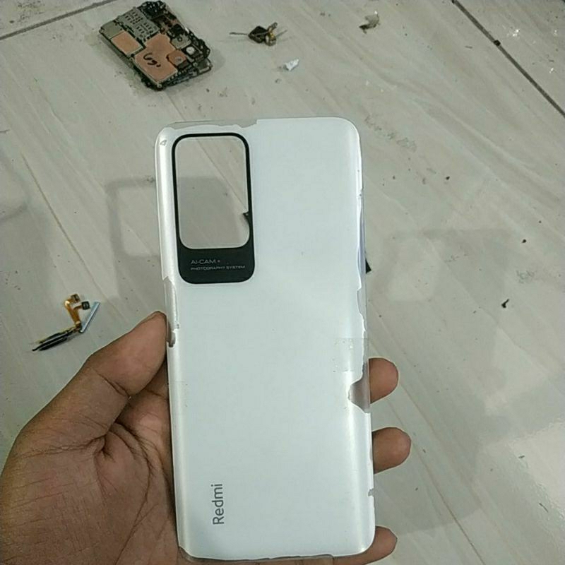 backdoor bekas Redmi 10 minus cat mengelupas seperti di gambar