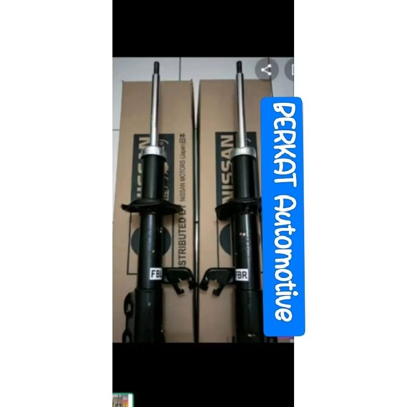 shockbreaker Nissan March depan
