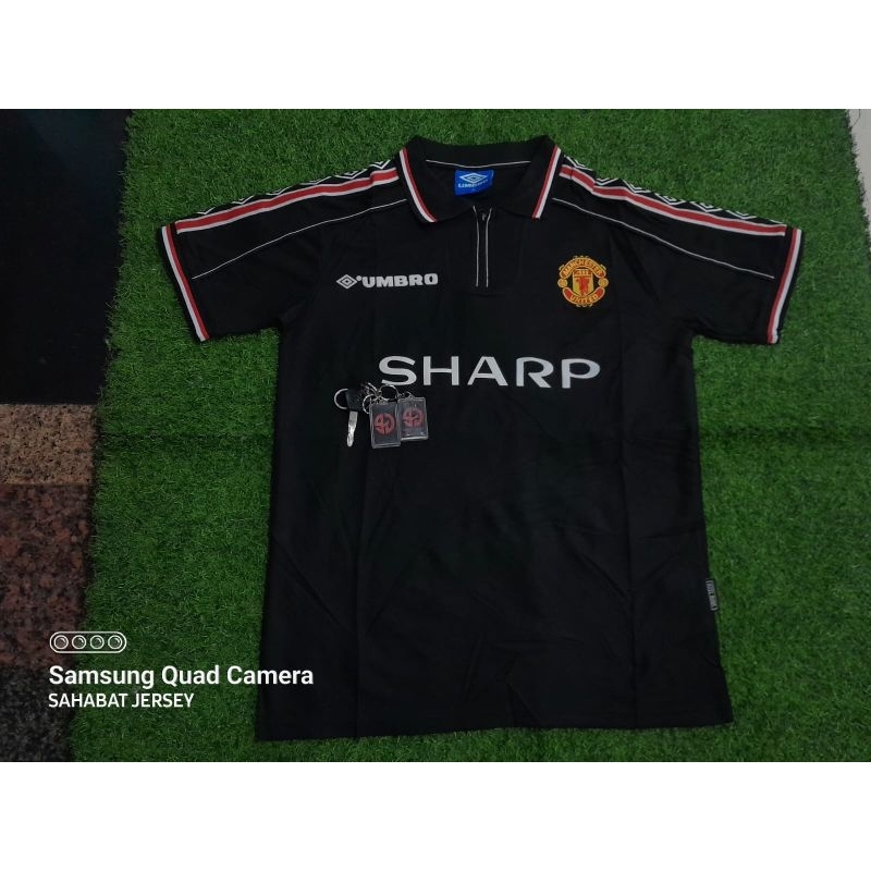 Jersey MU Trebell Hitam Retro 1999