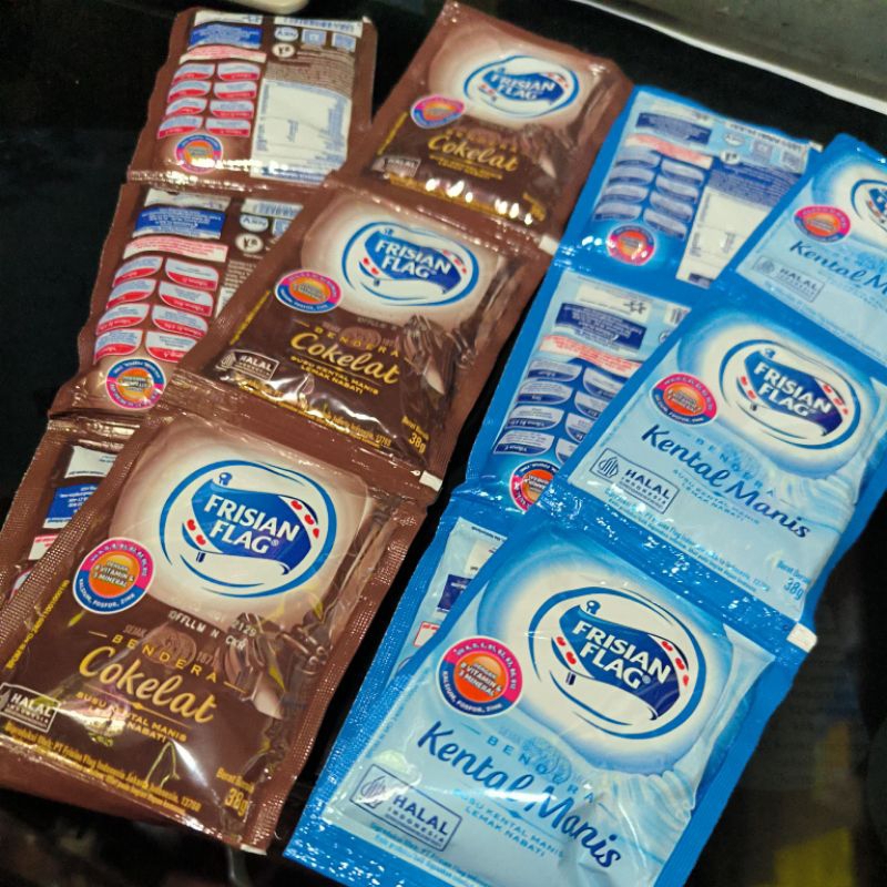 

Susu Kental Manis Frisian Flag Susu Bendera Sachet SKM coklat SKM Putih isi 6