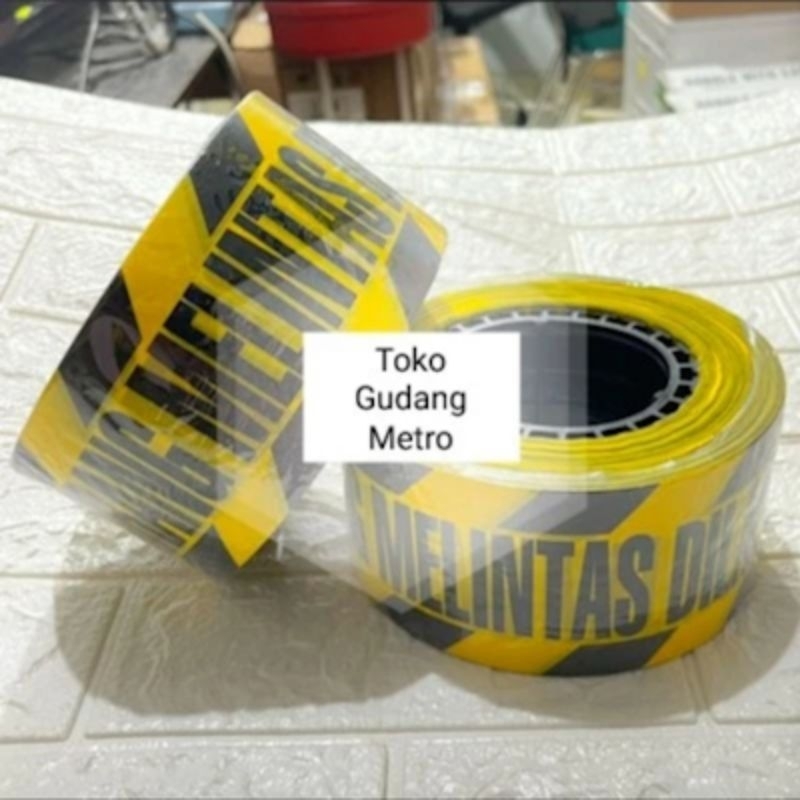 Pita pembatas/ Police line/ Dilarang Melintas