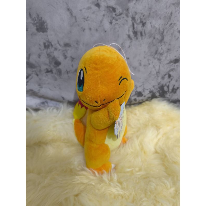 Boneka pokemon Api mata kedip