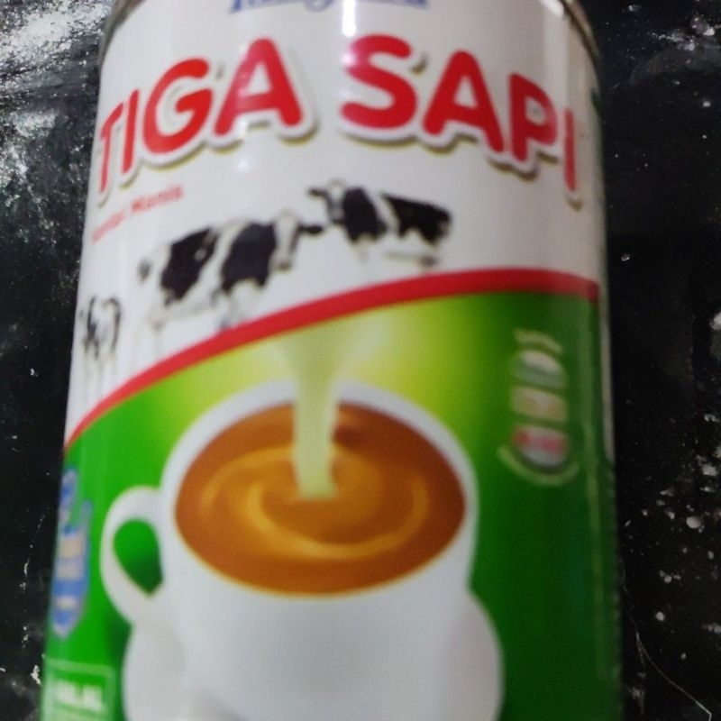 

krimer tiga sapi kaleng besar