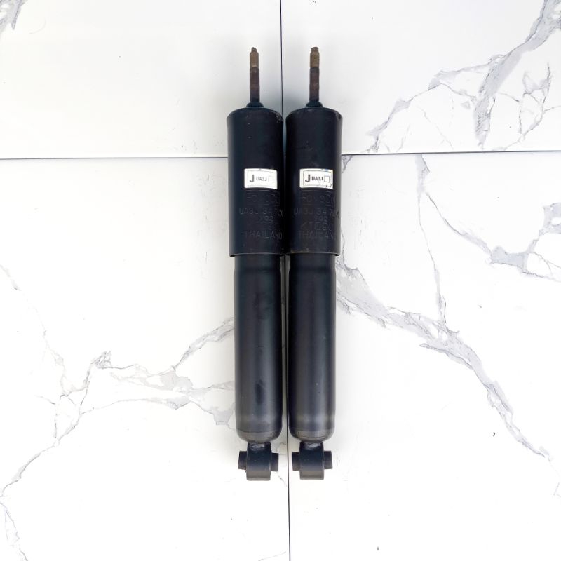 shock mazda bt50 depan