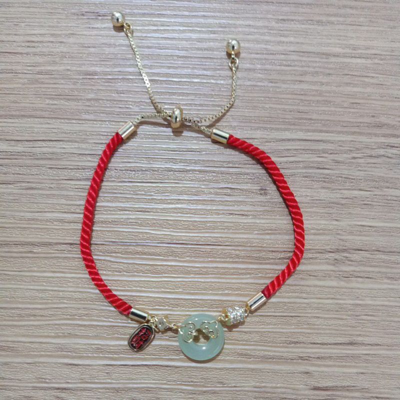 Gelang serut tali merah giok donat