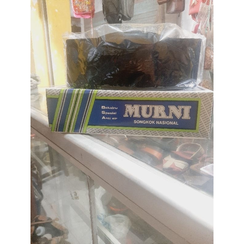 peci hitam MuRNi