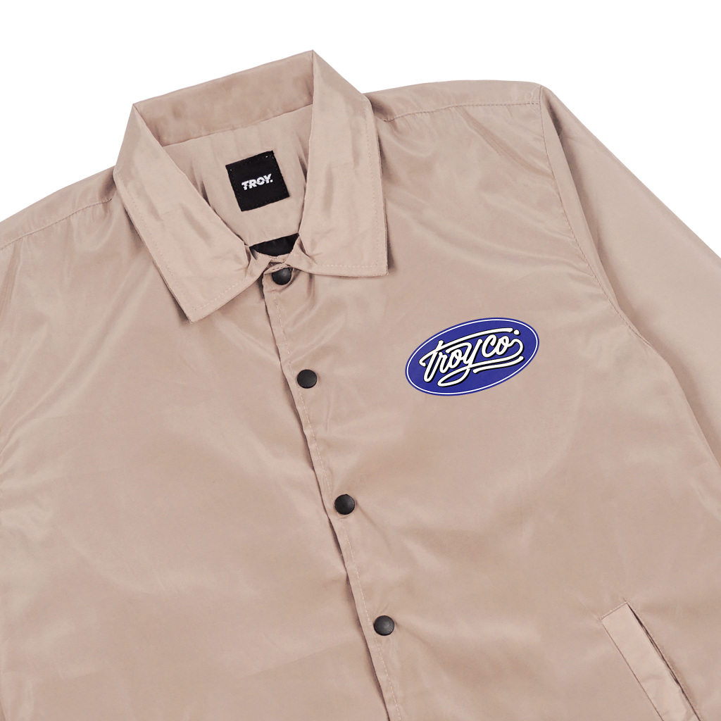 Troy Company Coach Jacket Owalny Khaki - Jaket Windbreaker Coklat Khaki WN 3131
