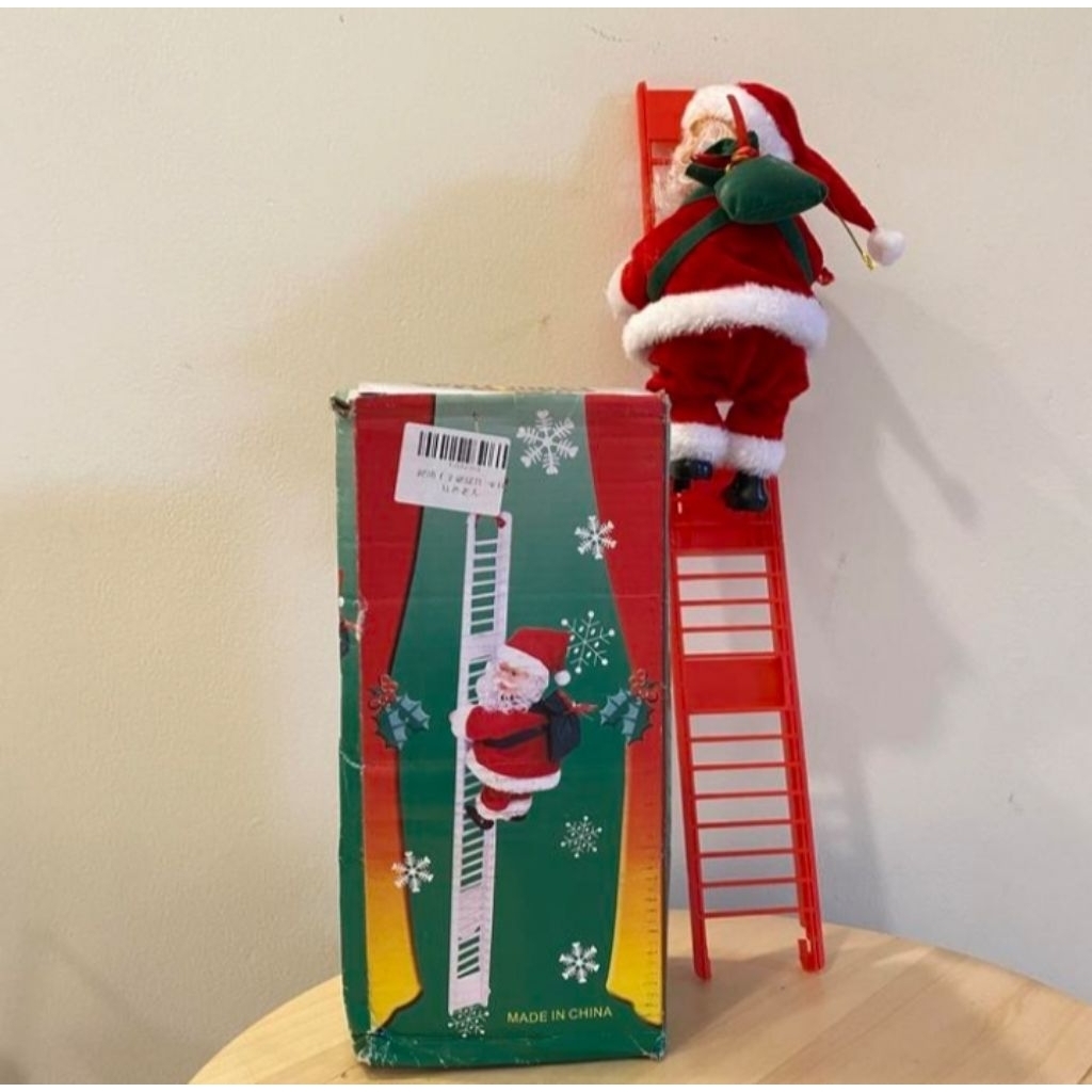 Santa Claus Climbing Ladder Decoration.