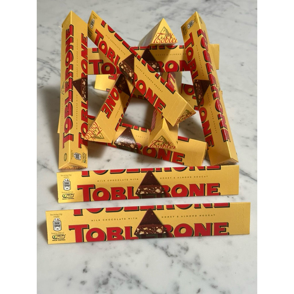 

Toblerone Coklat batangan (100g) Varian Coklat Nougat Almond