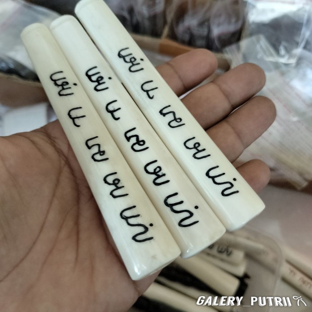 Pipa once / once cangklong tulang ukir aksara Jawa