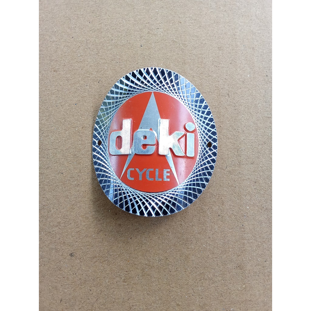 Emblem Sepeda Plat Merk Deki