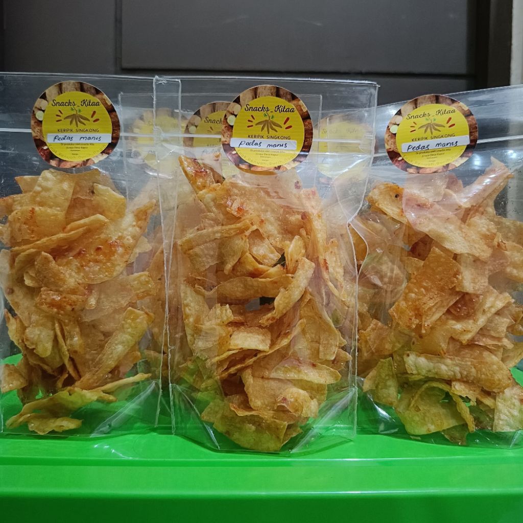 

KERIPIK SINGKONG PEDAS MANIS, Kemasan icip -+70gram,Renyah,Gurih,Nagih