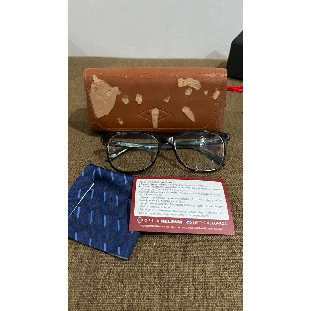 Kacamata by optik melawai