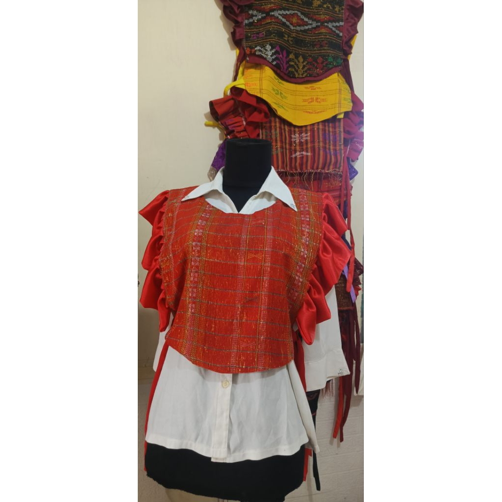 outer / rompi ulos batak