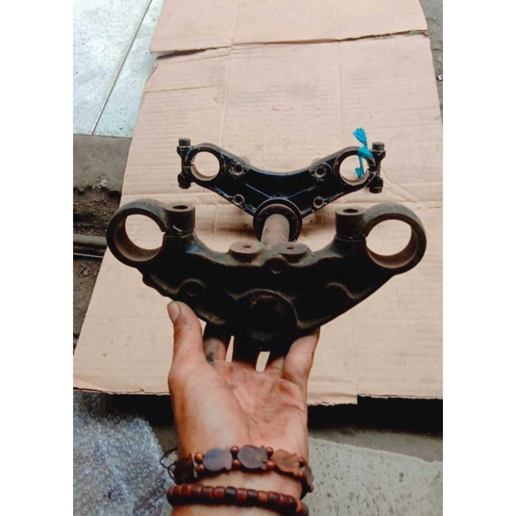 SEGITIGA T HONDA REVO MEGAPRO LAMA ORI