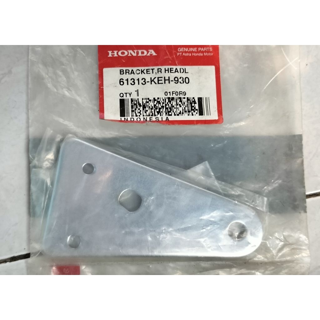 61313-KEH-930 Breket Kuping Lampu Depan kanan Megapro Primus ORI AHM