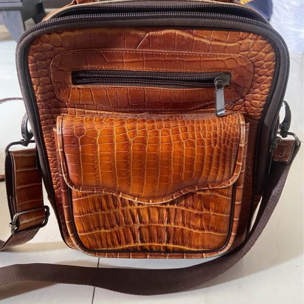 tas kulit buaya asli papua