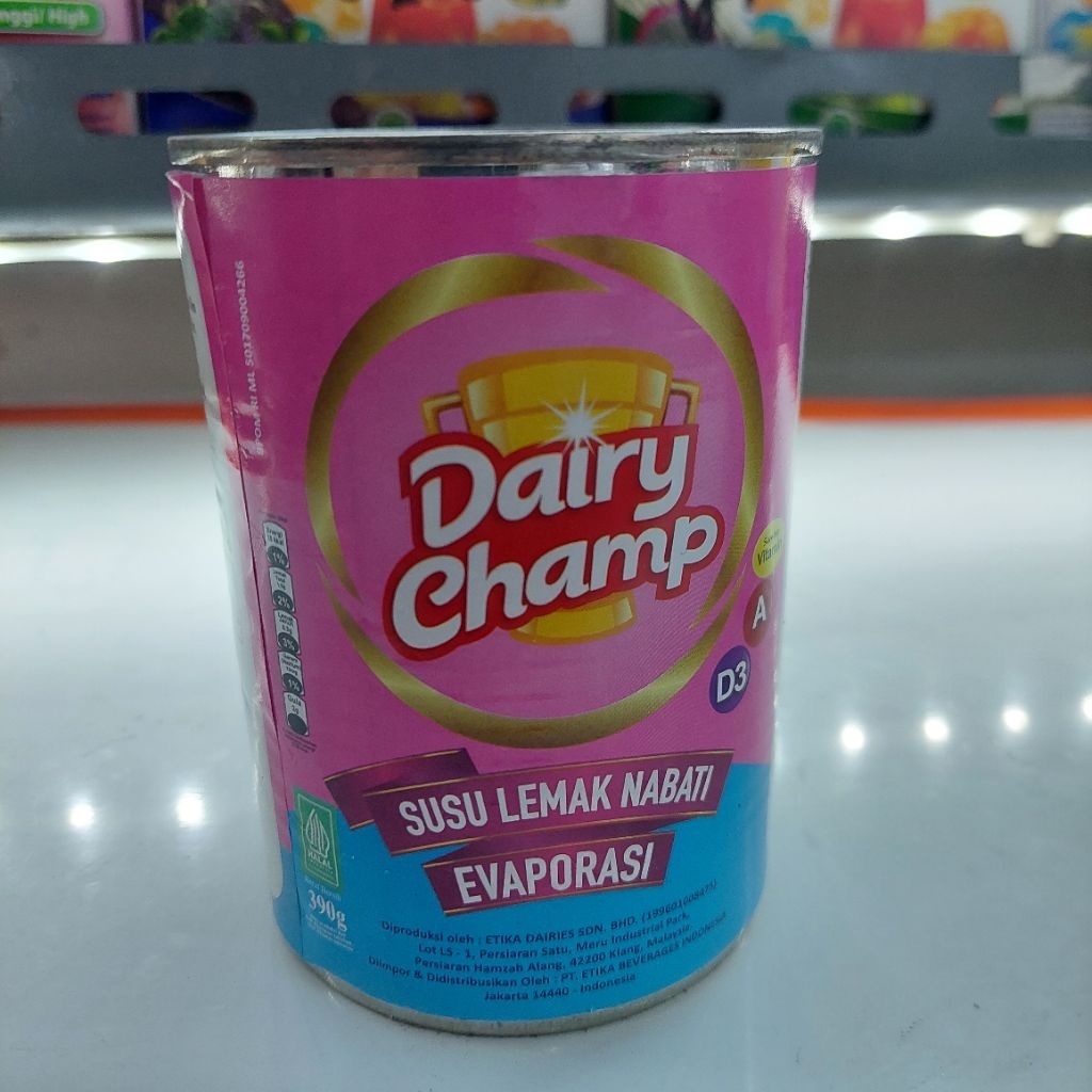

Dairy champ susu lemak nabati/susu evaporasi 390gr