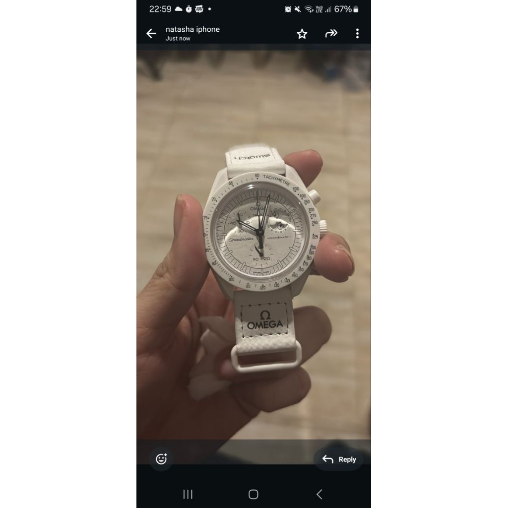 Swatch  x Omega Snoopy