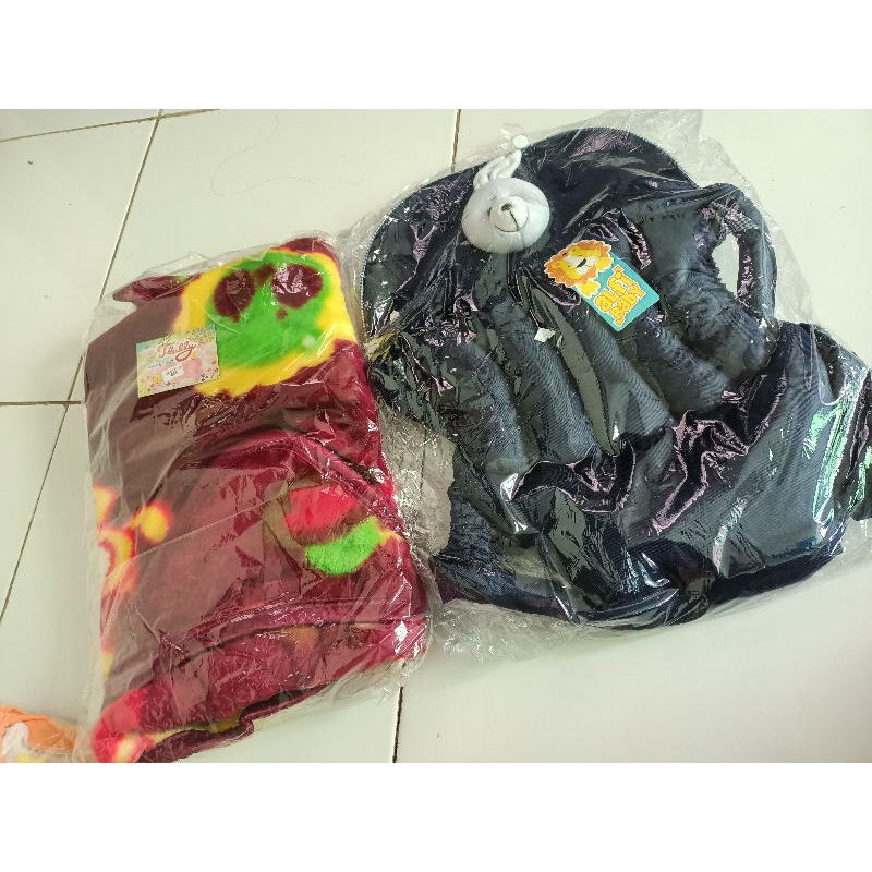 Gendongan dan selimut bayi