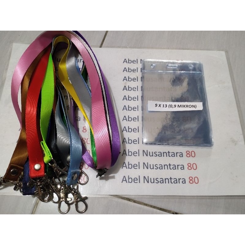 

paket Tali 1,5 cm polos+plastik panitia uk 9x13cm isi paket 10 pcs tebal plastik 0, 9 mikron
