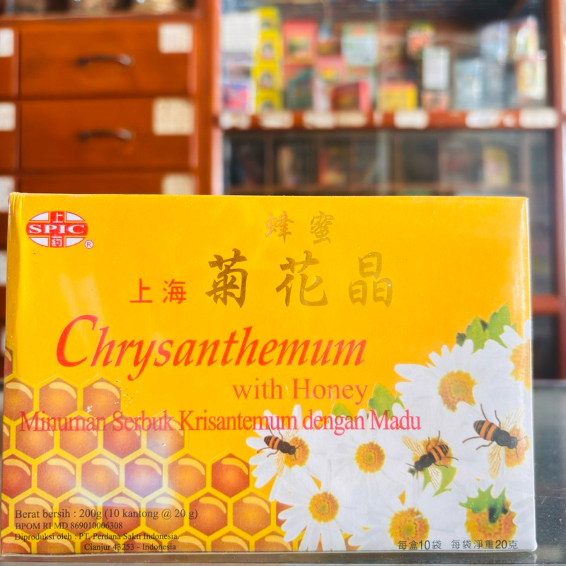 

Chrysanthemum tea dengan madu untuk panas dalam