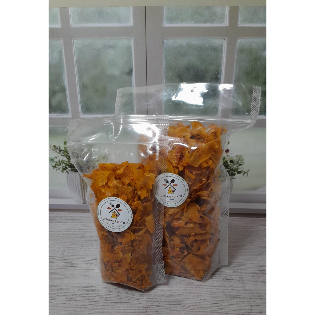 

Cemilan Adiktif - Kripik Singkong Pedas Kriwil 250 gr dan 1 kg