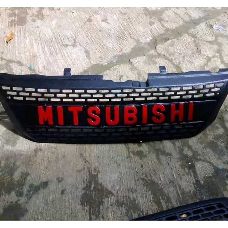 Grill Mitsubishi Strada L200