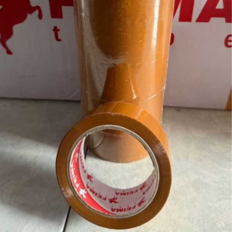 

Lakban selotip coklat/bening