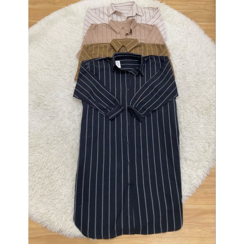 Tunik wanita motif garis-garis