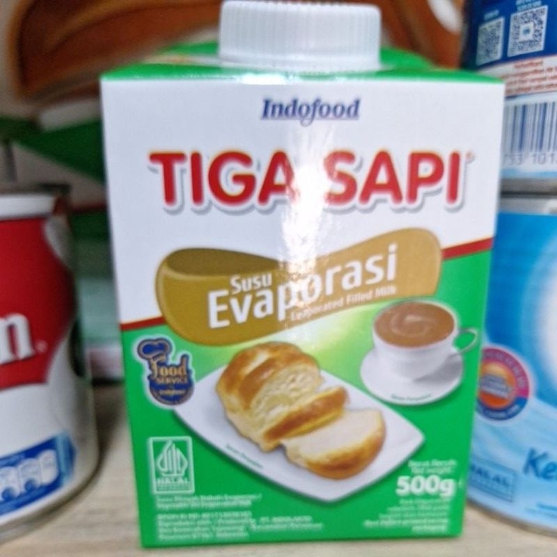 

tiga sapi susu evaporasi