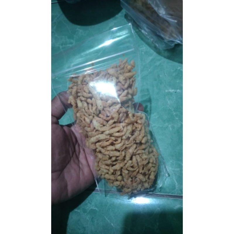 

LEMPUK CRISPY 100 GRAM IKAN KHAS DANAU RANU GRATI