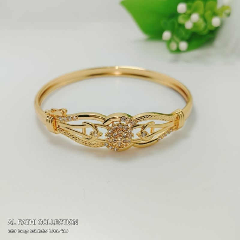 Gelang tangan bangle warna emas motif matahari