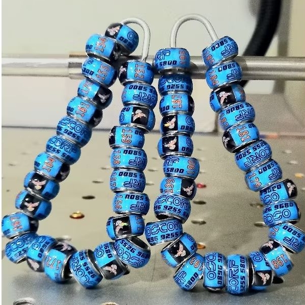 Ring burung merpati bahan baja stenlis bisa reques nama dan nmer hp dan warna sendiri Ring burung bi