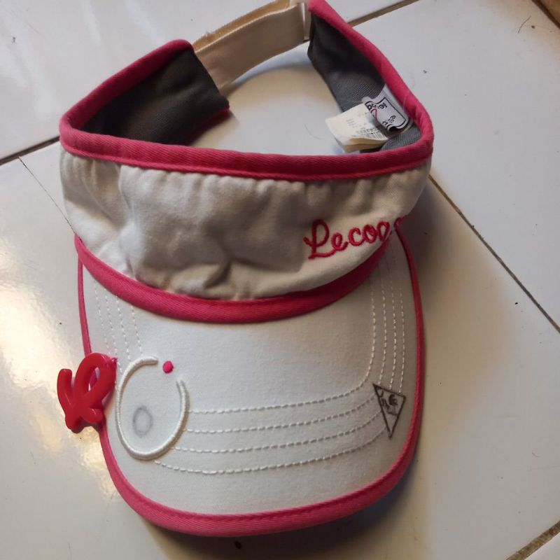 topi golf le coq sportif