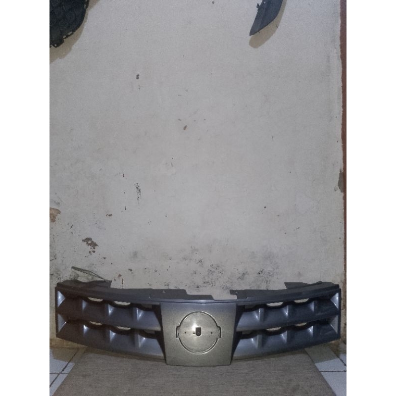 base Grill NISSAN GRAND LIVINA 2008-2013