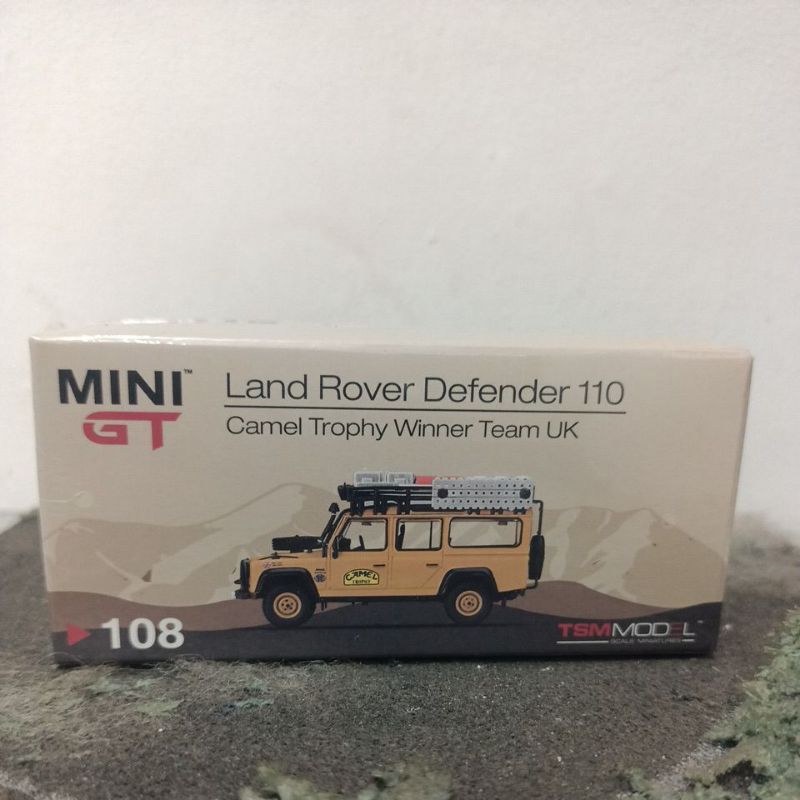 Mini GT#108 Land Rover Defender 110 Camel Trophy Winner Team UK
