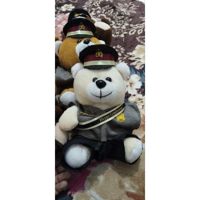 Boneka mini polisi