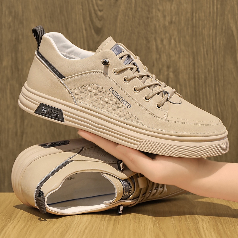 Model terbaru Sepatu pria formal Sepatu olahraga impor Sepatu pria kasual Sepatu kulit putih