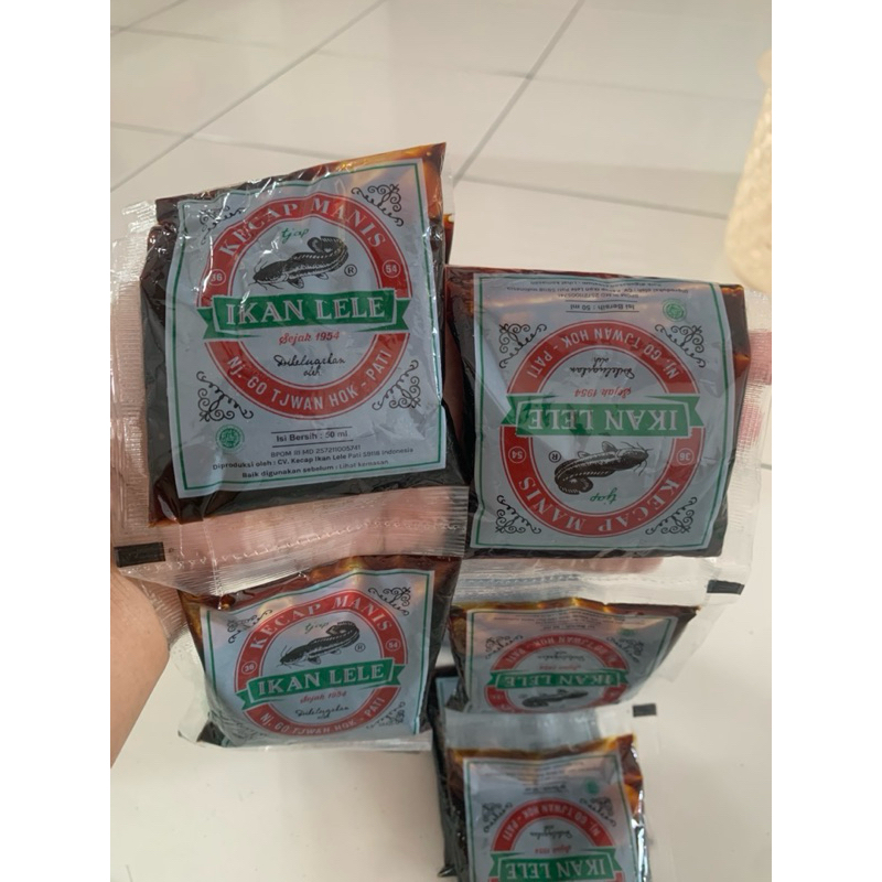 

Kecap Lele Khas Pati kemasan 50ml 1pax isi 12pcs