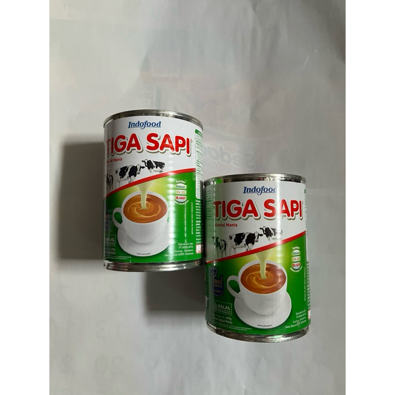 

susu kental manis tiga sapi kaleng