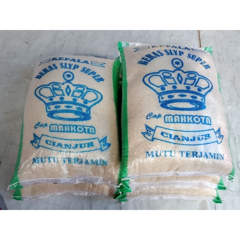 

Beras cap Mahkota kemasan 5kg