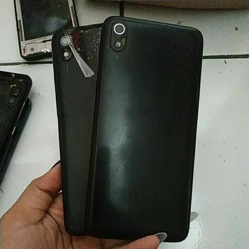 Backdoor bekas redmi 7a minus bagian tombol